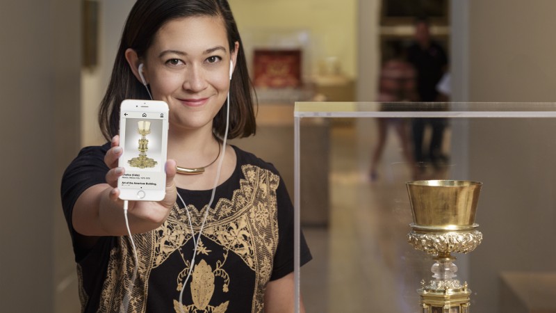 LACMA App User Holding Mobile Device